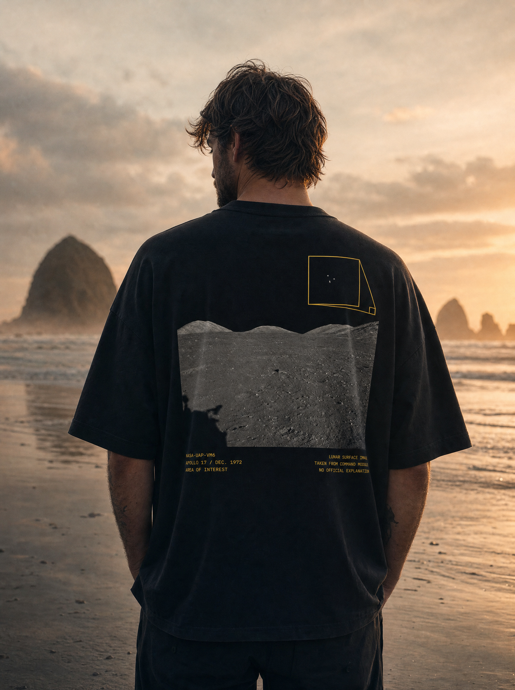 Apollo 17 tee back print - model on beach, cinematic